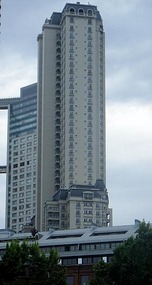 Skyscraper with mansard roof