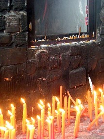 Candles and cigarettes for the Gauchito