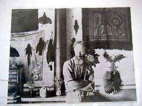 Quiroga and lots of dead stuff hanging around him!