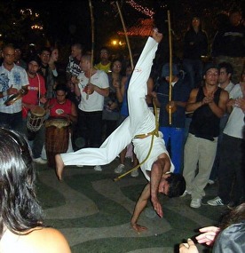 Capoeira and berimbau players