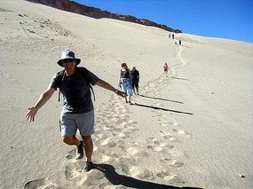 Tony coming down the sand dune