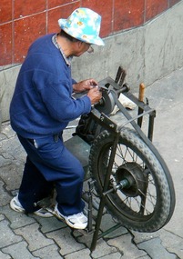 Knife sharpening guy in the street