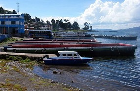Our boat boards the ferry at San Pablo de Tiquina