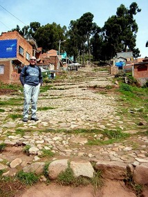 Tony climbs the Inca staicase to Cerro Calvario