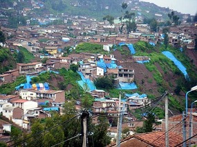 Blue plastic to try & prevent more landslides