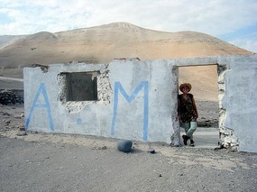 Look for a white house with AM written on it....