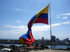 T takes the Colombian flag