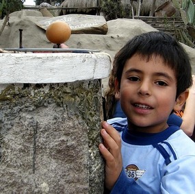 Tomas balances his egg