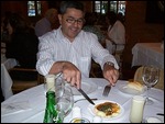 Miguel cuts the cheese 