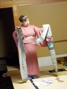 Learning how to tie the kimono sash