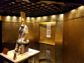 Samurai figure in gold leaf museum