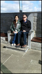 Trying out the Pope's Chair at Clonmacnoise