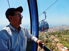 Jim on the cable ride down from Monte