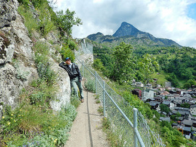 Good solid fence hugs the trail