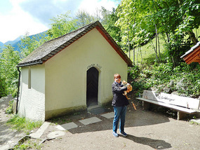 The outside of the chapel; Nelly with a stray cat.