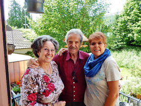 Tita, Erwin and Nelly on their balcony