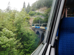 Train curves into tunnel