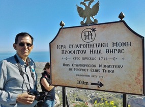 AT THE TOP OF THE MOUNTAIN, THERE IS A MONASTERY. 