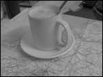 Coffee drinking and map reading