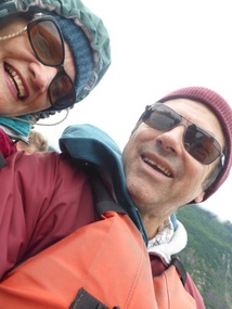 Having fun, working hard, in the canoe