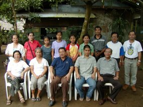 01 Local members pose at a home