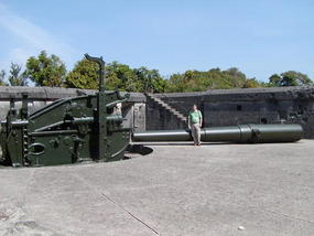 Dave Baker by a dismounted canon