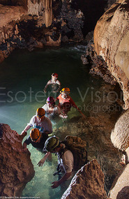climbing through the cave