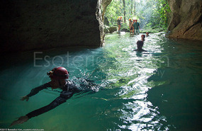 swimming into the cave