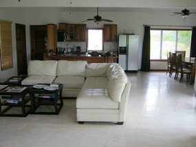 The living room/kitchen area of our room!