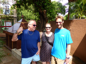Roy, Ken and Jayna by the hotel's shrine