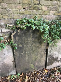 Old tombstones (1811) around the edge of the park