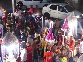 Groom follows on horseback