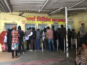 Line up at the pharmacy to pay