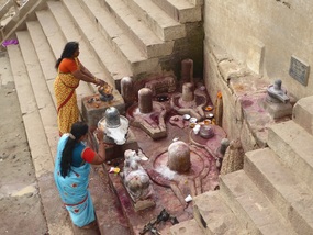 People worship at Lingam sculptures