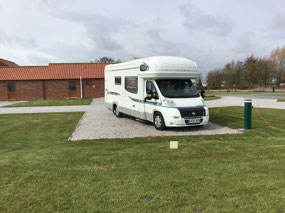 The pitch by the bathroom block