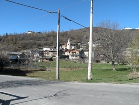 VIEW FROM ROAD UP TO APARTMENTS