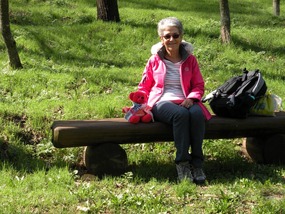 RED TED AND GWEN RESTING IN NATURE PARK