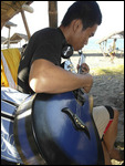 Andoy strumming at Navitas