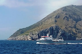 Old tower to the left of the boat (on land!)