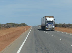 main highway with small road train