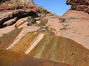 rocks looking up part waterfall