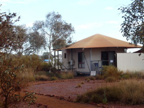 Our work hut us parked behind