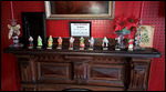 Santas on the mantle piece