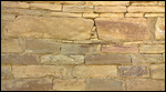 Look at the little rocks in the wall