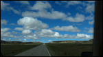 Road heading 12 miles to destination