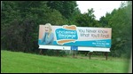 Billboards leading into town