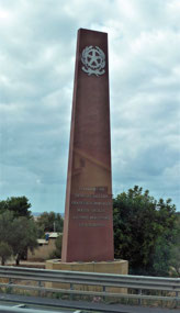 We pass the site of the Capaci Bombing in 1992