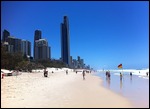 Skyscrapers + beach = Surfers
