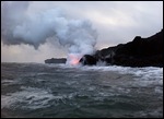 Steam from red hot lava heating sea water 