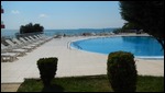 THE VIEW OF THE POOL AND OCEAN FROM OUR PATIO
